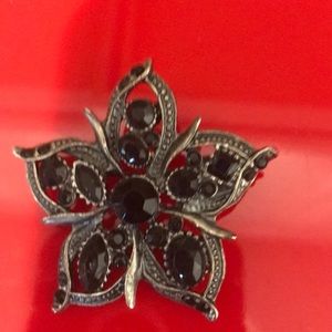 Brooch. Faux pewter with black stones.